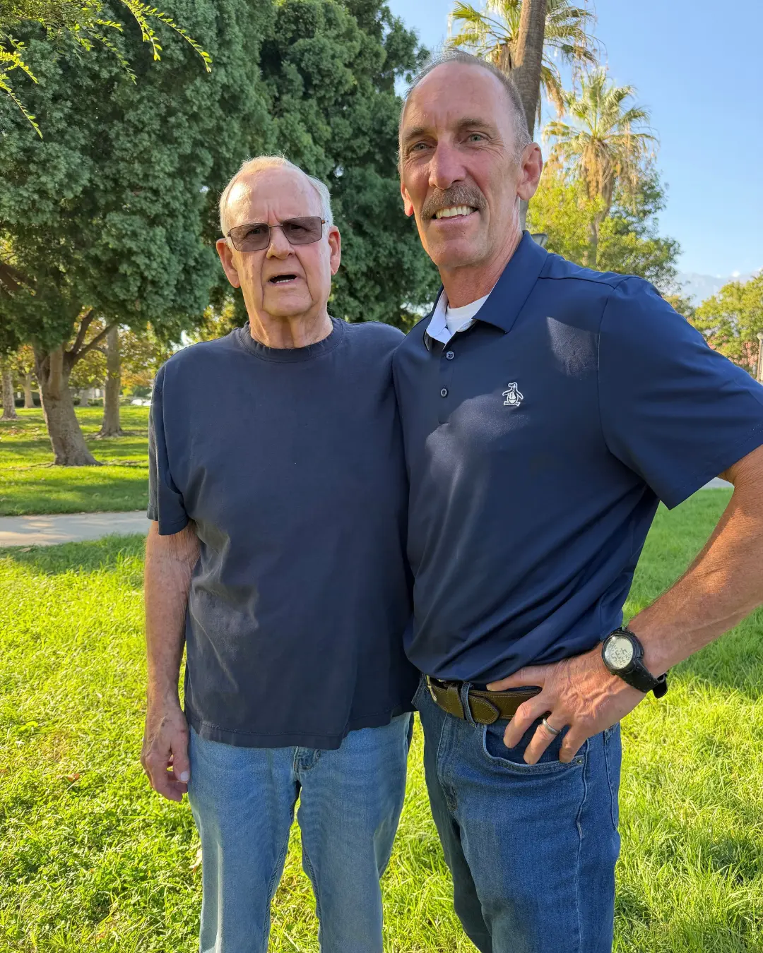 Art Andres with a community member at a local park