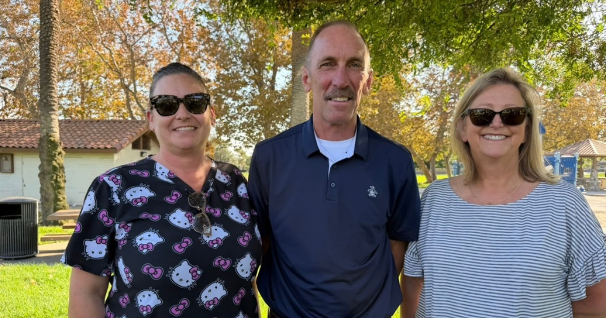 Art Andres with two members of the Alta Loma school community