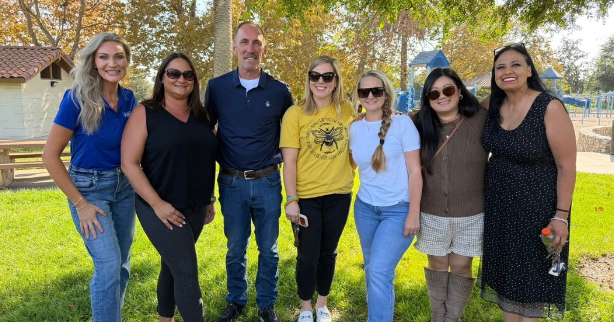 Art Andres with members of the local school community at a park